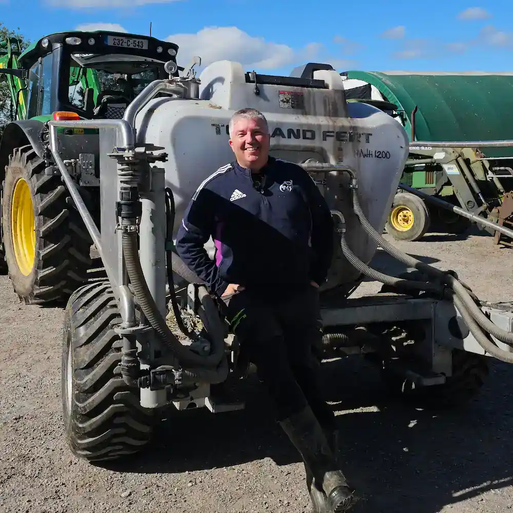 Conor O'Leary leaning on his Multi 1200 Tow and Fert Spayer